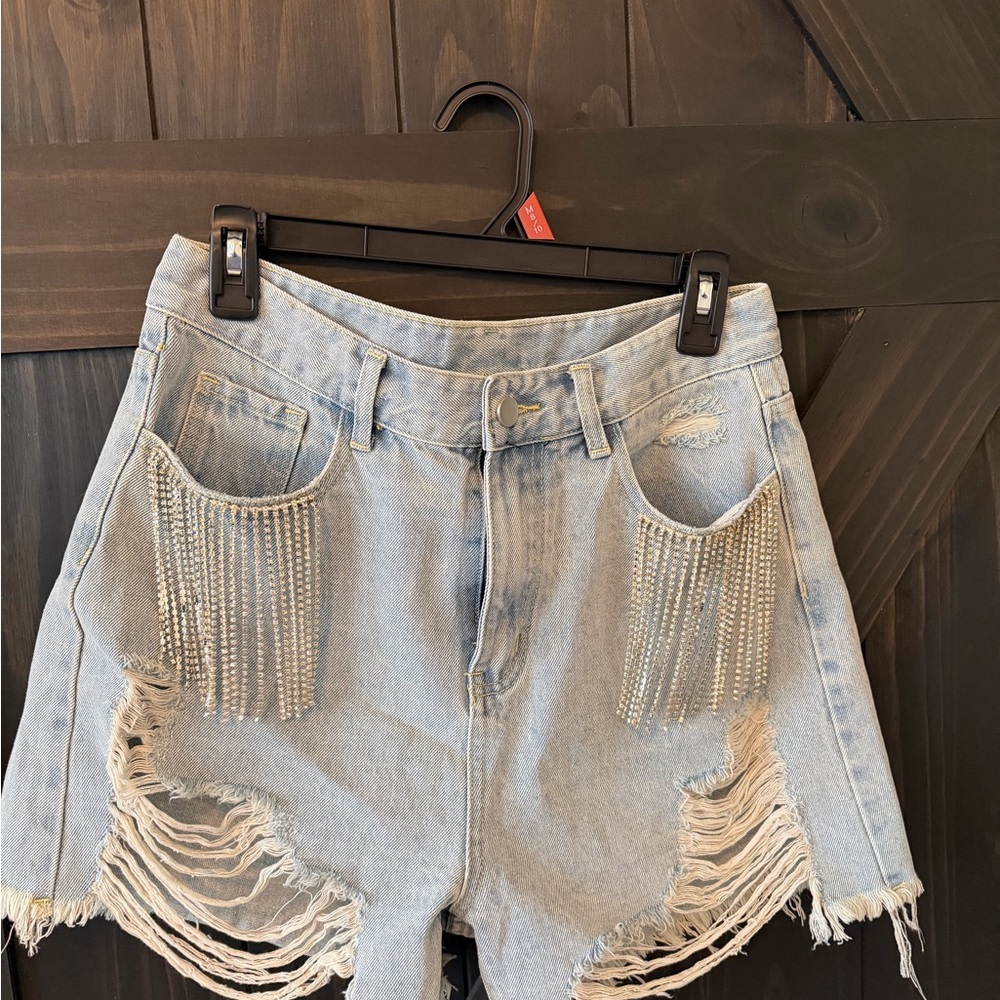 Light Wash Denim Fringe Shorts with Rhinestone Pocket Detail